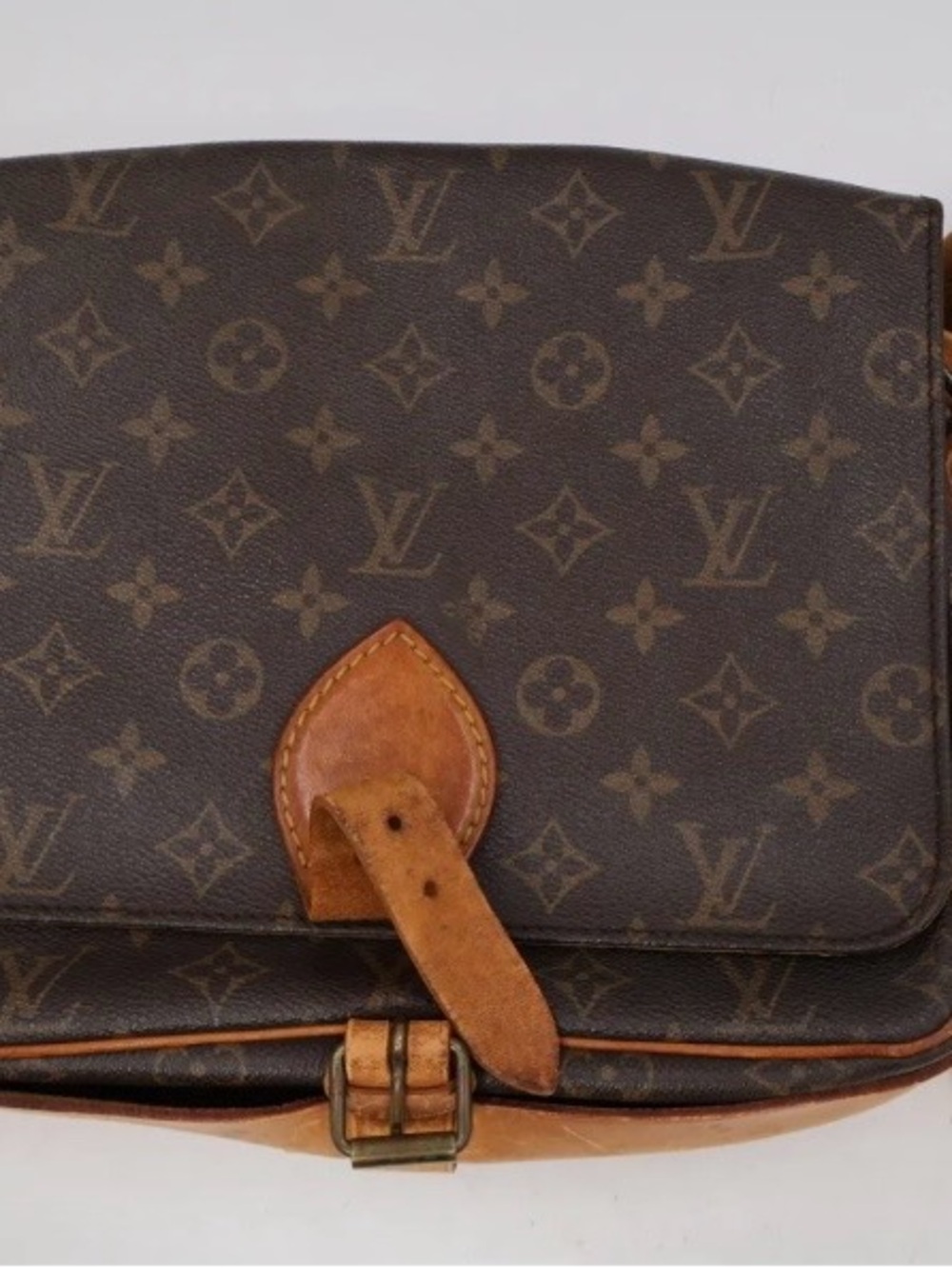 LV messenger bags Cartoucherie 10.2 W x 3.0 D
× 8.3 H inches.